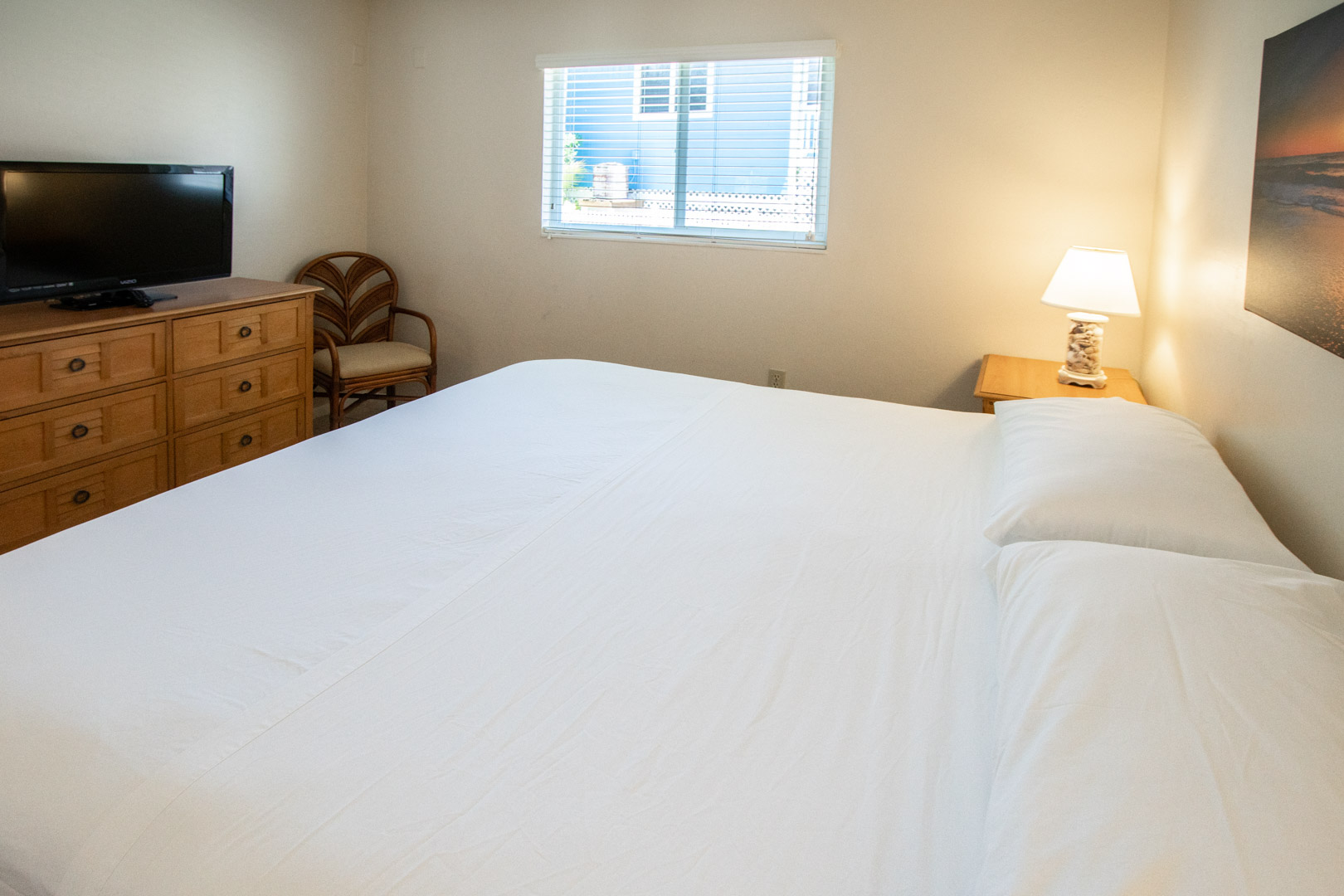 A spacious bedroom at VRI's Windward Passage Resort in Fort Myers Beach, Florida.